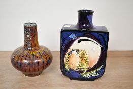 Two contemporary Cobridge Stoneware (Black Ryden) Pottery art vases, featuring a stylised bird and