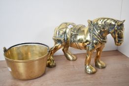 A large 19th-century heavy brass Shire horse figurine, featuring detailed harness work; sold with
