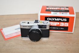 A boxed Olympus Trip 36 camera