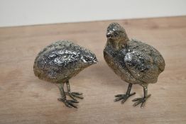 Two mid 20th-century metal game bird figurines, most likely quails, unmarked, 10cm and 14cm in