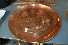 A 20th-century Arts and Crafts Morecambe HEC (Home Encouragement Centre) copper charger, founded