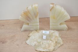Two early 20th-century Art Deco-style hard stone onyx type bookends, of fan-like form; sold with a