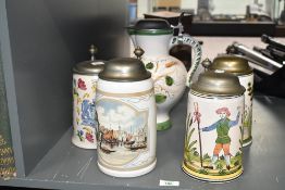A quantity of vintage German pottery Holsten-Brauerei type beer steins, featuring traditional hand