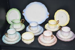 A 20th-century Royal Albert fine bone china 'Rainbows' part tea set, featuring pastel coloured rim