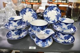 A quantity of early 20th-century Alfred Meakin Limited semi-porcelain flow blue tableware, featuring