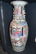 A tall 19th-century Chinese Famille rose porcelain palace type vase, featuring hand painted