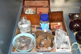 A box of British and World coinage, with an 20th-century amount of current mixed/cupronickel and