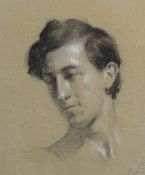 A 20th Century charcoal on paper portrait, depicting a young man, indistinctly signed, within a gilt