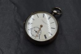 A Victorian silver open face key wound pocket watch, the white dial marked 'J. Greenbank & Sons