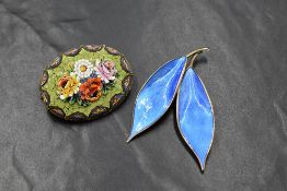 A Norwegian silver blue enamelled double leaf brooch by David Anderson, approx 72mm long, and an