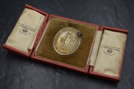 A 9ct gold 'The Confectioners Bakers and Allied Trades Exhibition London' presentation medallion,