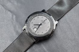 A boxed Junghans Mega Solar Ceramic wristwatch, the black dial having Arabic numerals and baton