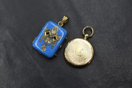 A yellow metal presumed gold locket, of circular form having engine turned decoration to both sides,
