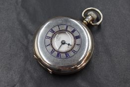 A silver Omega side wound Half Hunter pocket watch, movement no:7781868 having an Arabic numeral