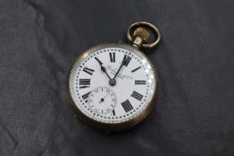 An Edwardian Continental silver top wound pocket watch stamped 935 having a Roman numeral dial