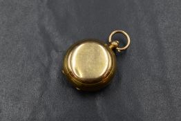 A Victorian 9ct gold sovereign holder of traditional plain circular form, approx 16.3g