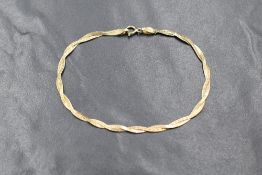 A 9ct gold plaited chain bracelet, marked 375, 19cm, 1.4g