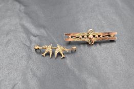 A yellow metal bar brooch stamped 9ct having ball & loop decoration and a yellow metal brooch part