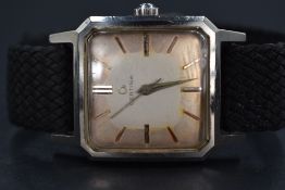 A vintage Certina wristwatch, the square champagne dial having baton five minute markers, in a