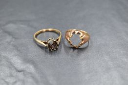 Two 9ct gold and yellow metal presumed gold ring settings, one of solitaire design and one of signet
