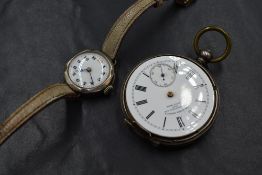 A white metal 935. grade pocket watch, lacking clear cover, hands and cracked dial, with movement