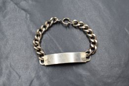 A silver identity bracelet with vacant panel, 25.7g