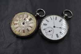 A white metal key wound pocket watch stamped fine silver having a rose gold coloured Roman numeral