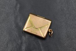 An early 20th century 9ct gold stamp holder of traditional envelope form, Chester 1920, approx 4.1g