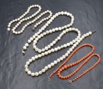 A 32' string of baroque pearls, a 16' string of cultured pearls of small even form having a magnetic