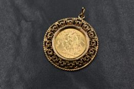 An Elizabeth II 1968 sovereign, in a 9ct gold pierced pendant mount, marked 375, 13.9g. Two claws to