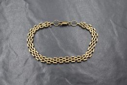 A yellow metal presumed gold, brick link bracelet having replacement 9ct gold clasp, approx 23cm