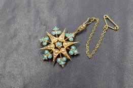 A 15ct gold pearl and turquoise set star brooch, with brooch back and pearl set pendant loop, marked