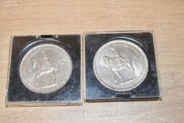 Two 1953 Queen Elizabeth II coronation crowns in plastic presentation boxes.