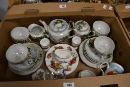 A Japanese part tea service having a hand painted design and lithophane Geisha to cup base (21), a
