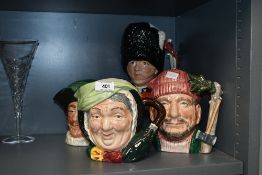 A group of four Royal Doulton bone china Toby Character jugs comprising 'Lumberjack' model number