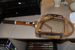 A Vintage Slazenger 'Challenge' tennis racket with patent Dunlop keeper/stretcher