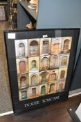 Porte Toscane poster featuring a grid of rustic old Tuscan doors under glass within a simple black