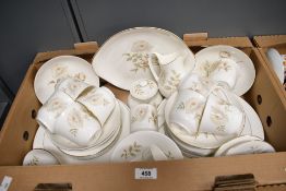 A Royal Doulton 'Yorkshire Rose' part tea/dinner service having some wear to gilt edging (53).