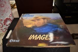 A collection of assorted LP records to include Don Williams, Glen Cambell, Chas and Dave and Max