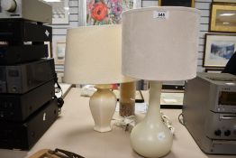 Two small table lamps both in cream one having a suede shade and measures 44cm.