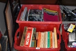 A collection of automobilia themed books in two cartons to include a large selection of Chilton's
