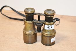 A pair of late 19th to early 20th-century brass binoculars, unmarked, 12.5cm in height, condition