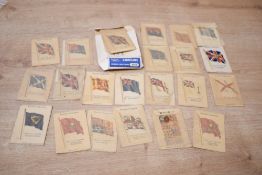 A part set (23) of Kensitas Cigarette silks featuring flags from the British Empire.