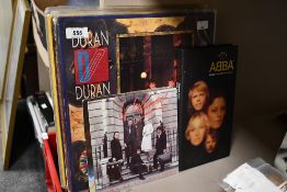 A small collection of LP records including Duran Duran, Thin Lizzy, Genesis, Nick Kershaw and