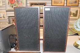 A pair of vintage Thorn Ultra speakers model 64517 having fabric fronts and mahogany effect cases.