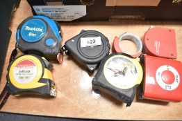 Seven retractable measuring tapes