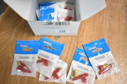 A small box of Bicycle pump adaptors