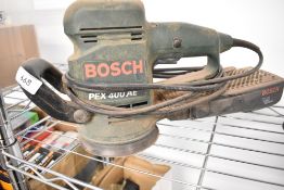 A Bosch PEX400AE orbital sander