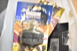 A bag and three boxes of sets of brake blocks
