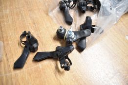 A bag of Shimano thumb triggers. (old new stock)